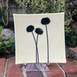 Load image into Gallery viewer, Puffs in black on cream